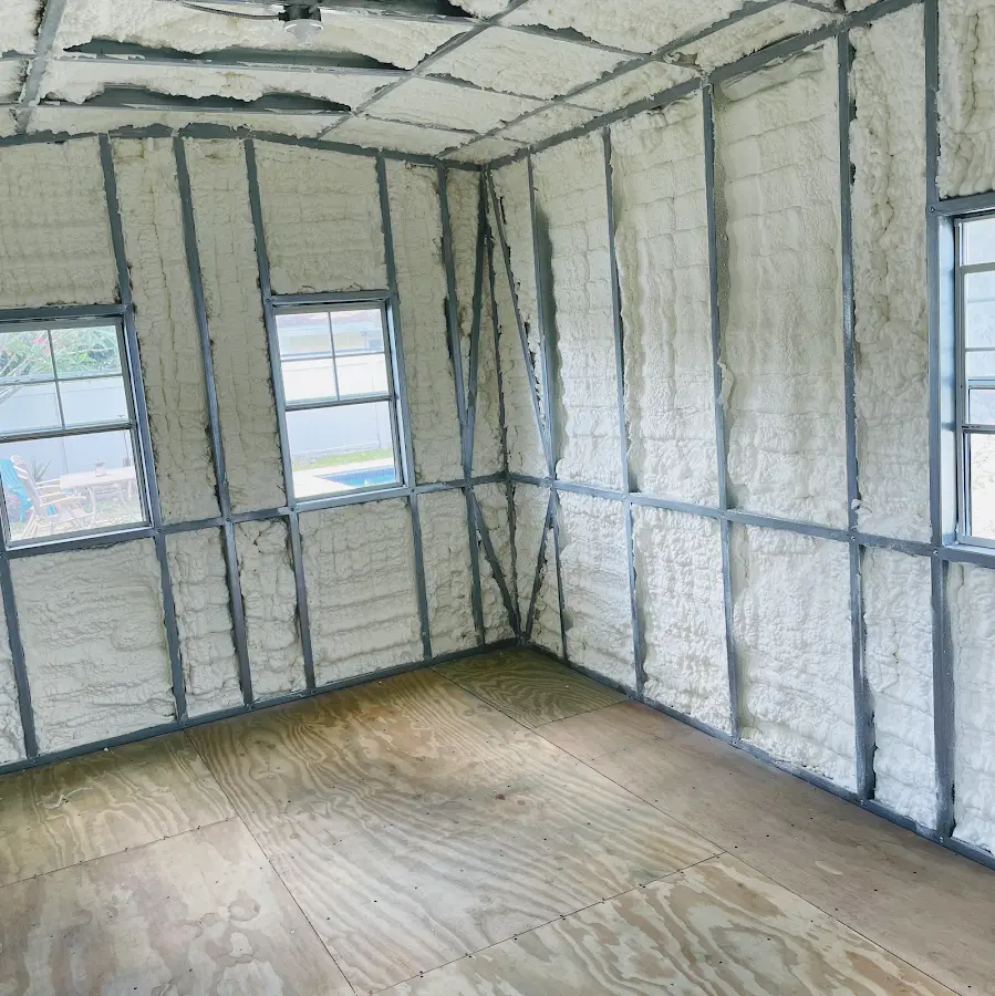 Closed-cell spray foam insulation applied to wall cavities in a residential project in Port St. Lucie